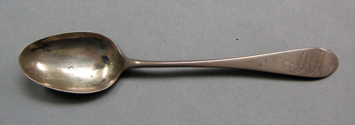 1962.0240.338 Silver spoon upper surface