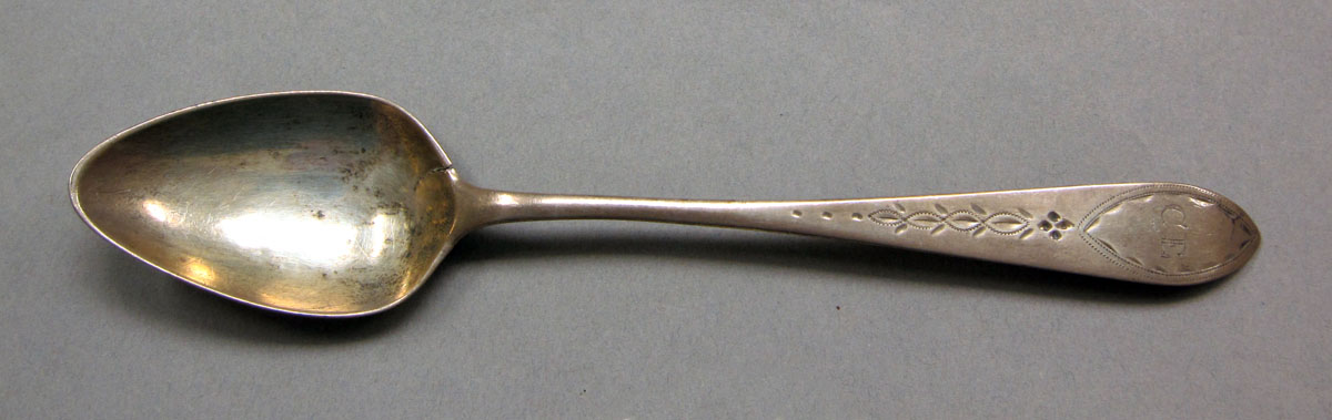 1962.0240.349 Silver spoon upper surface