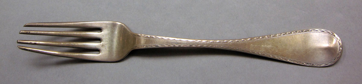 1962.0240.504 Silver fork upper surface