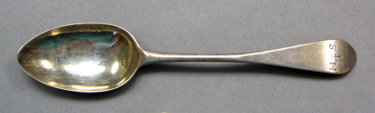 1962.0240.522 Silver spoon upper surface