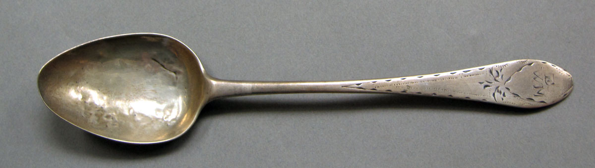 1962.0240.631 Silver spoon upper surface