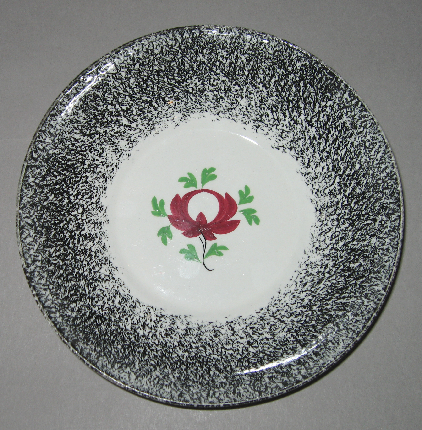1965.0950 B Spatterware saucer