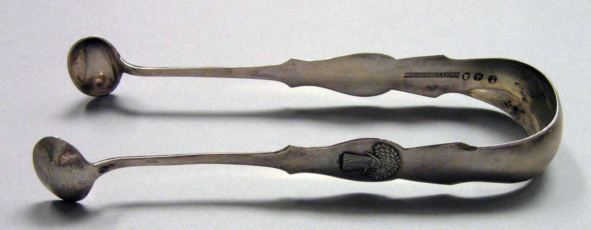 1962.0240.1618 Silver Tongs view 1