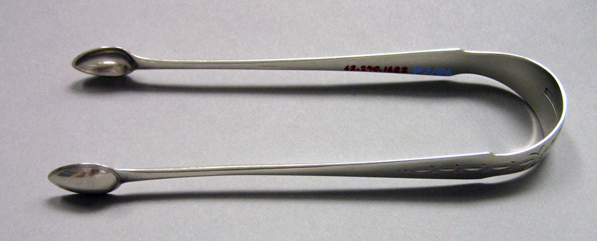 1962.0240.1622 Silver Tongs view 1