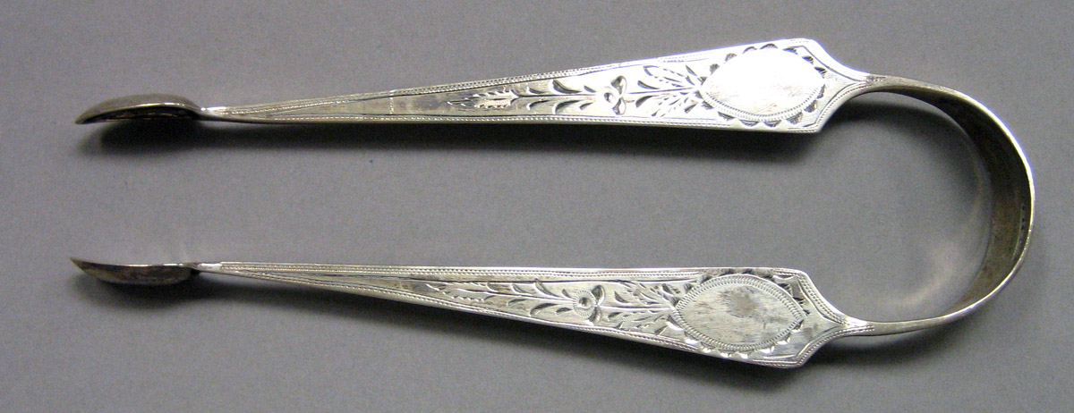 1962.0240.1627 Silver Tongs view 1