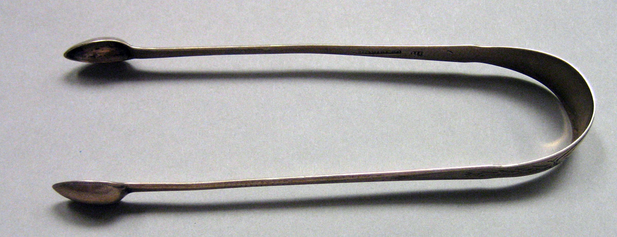 1962.0240.1629 Silver Tongs view 1