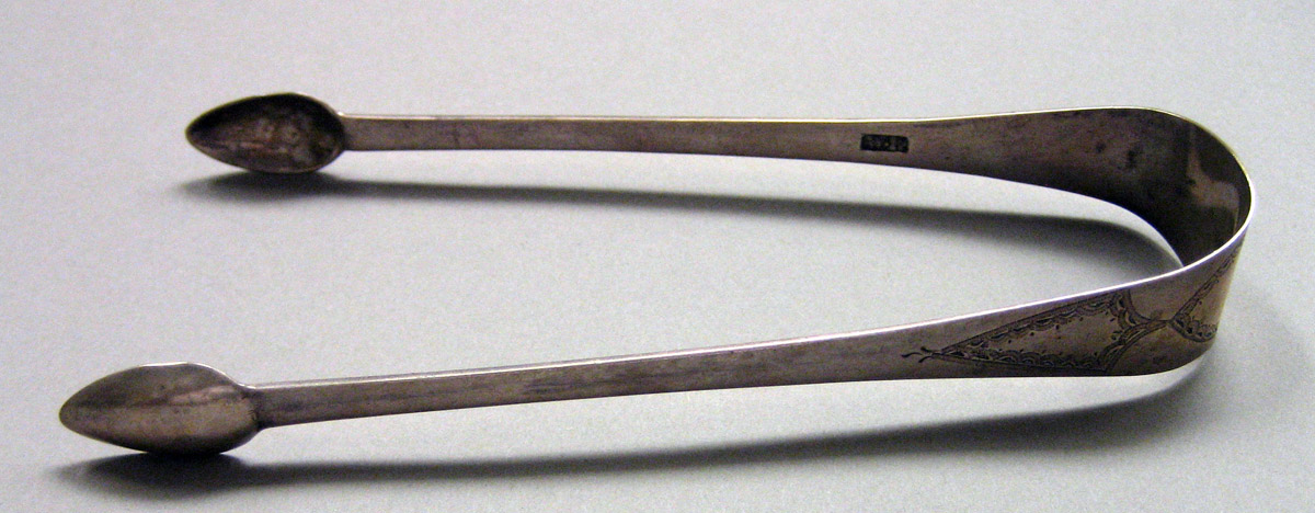 1962.0240.1630 Silver Tongs view 1