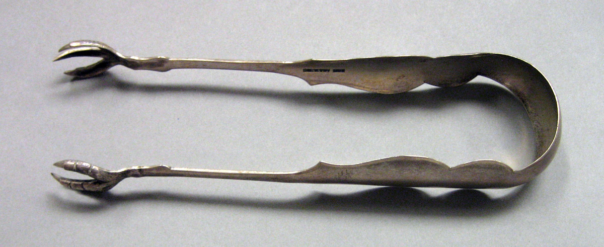 1962.0240.1637 Silver Tongs view 1