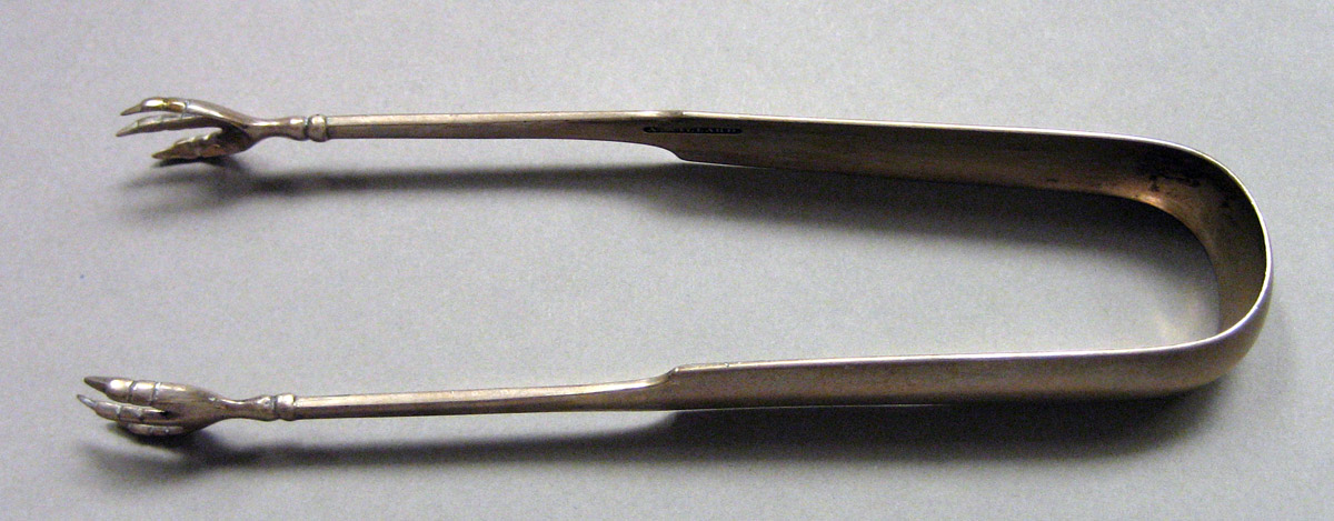1962.0240.1640 Silver Tongs view 1