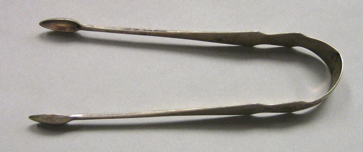 1962.0240.1644 Silver Tongs view 1