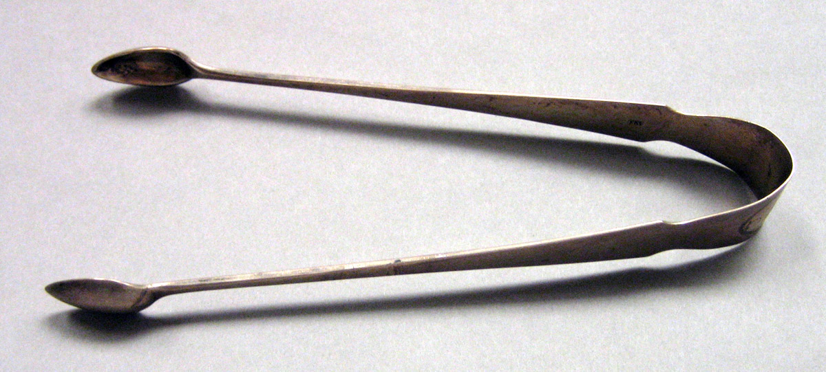 1962.0240.1647 Silver Tongs view 1