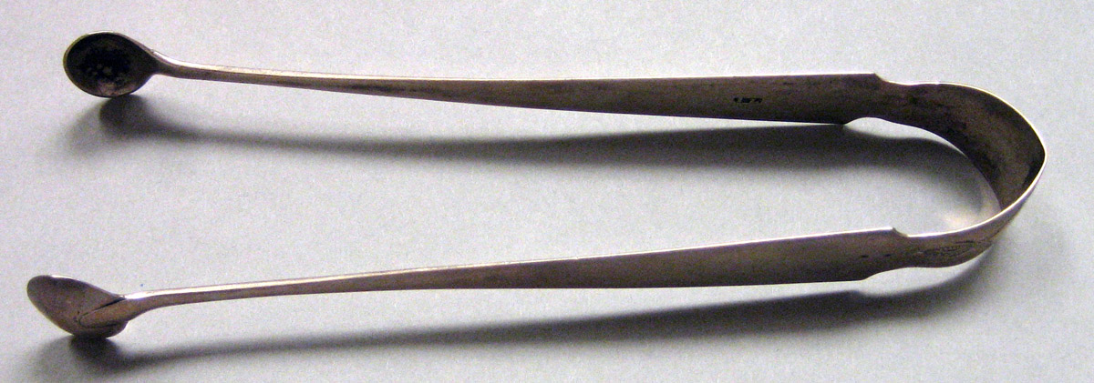 1962.0240.1649 Silver Tongs view 1