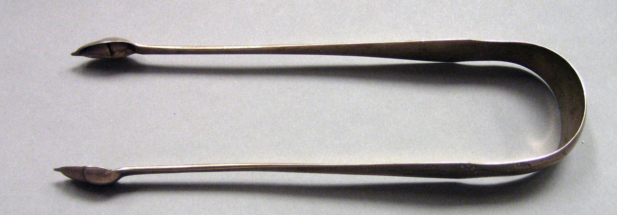 1962.0240.1651 Silver Tongs view 1