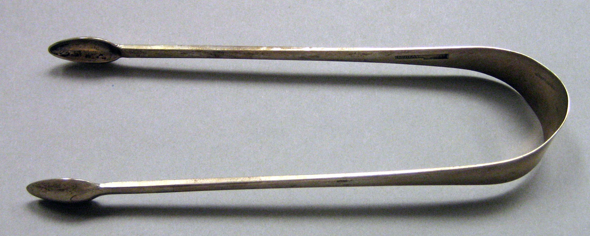 1962.0240.1652 Silver Tongs view 1