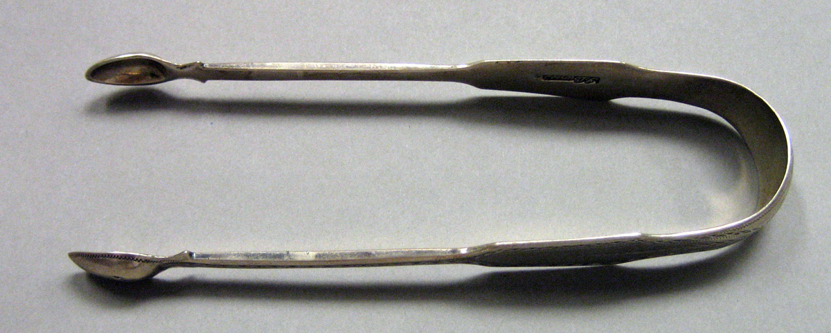 1962.0240.1655 Silver Tongs view 1