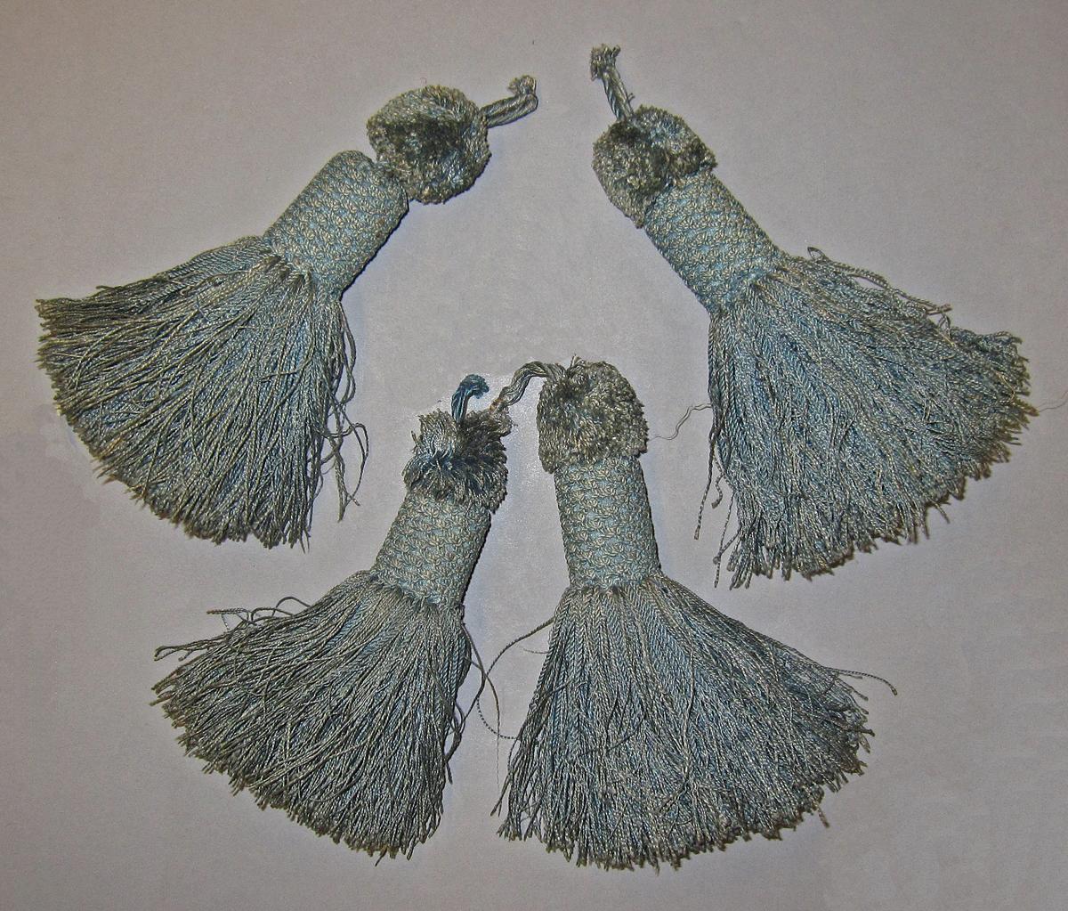 1961.300.1-.4 tassels