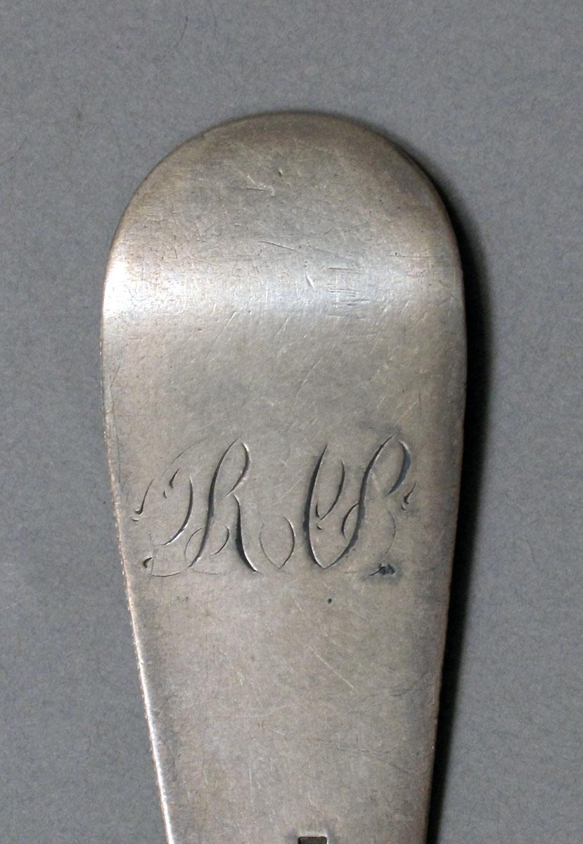 1962.0240.395 Silver spoon engraving