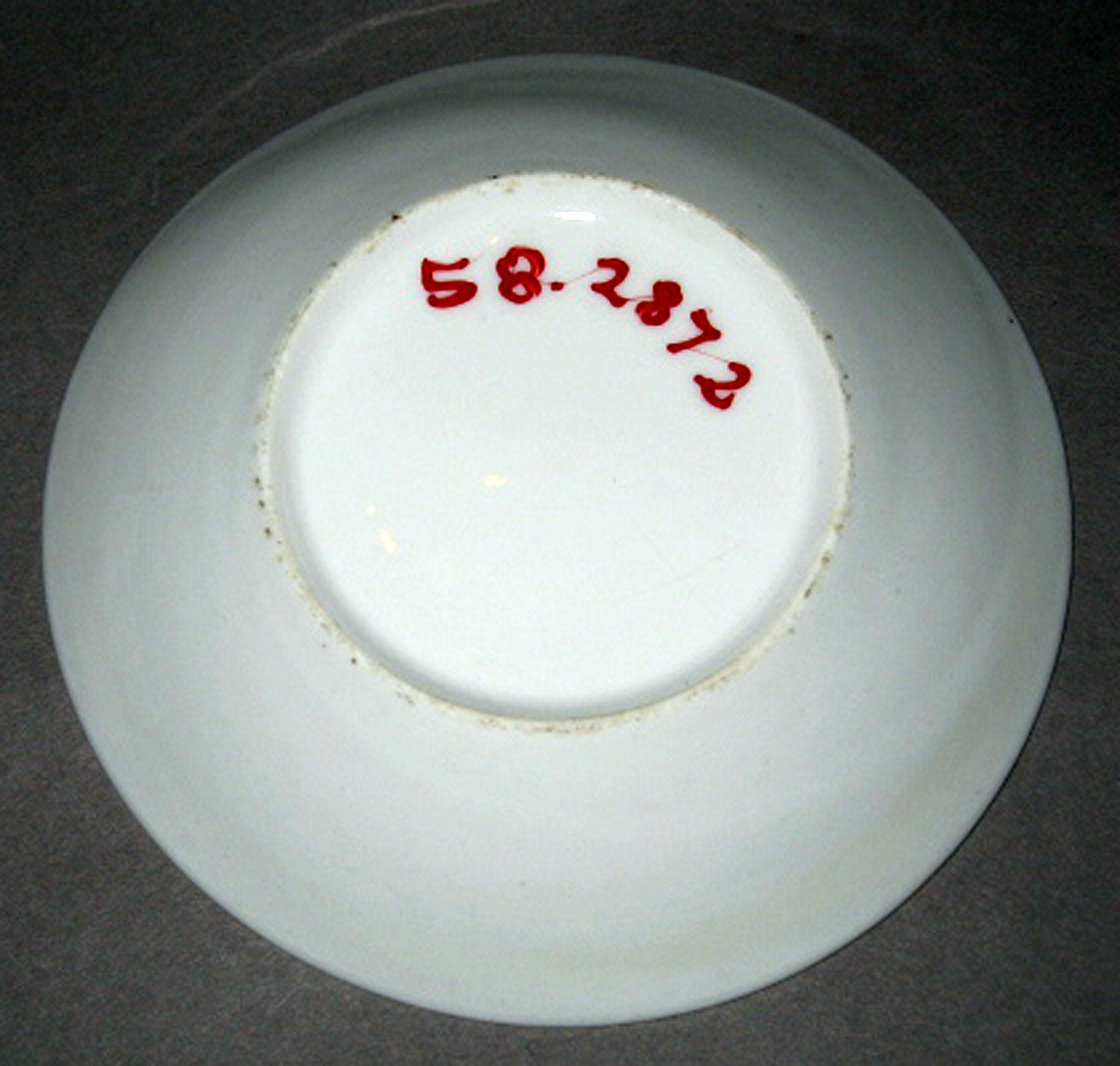 1958.2872 Porcelain saucer (underside)