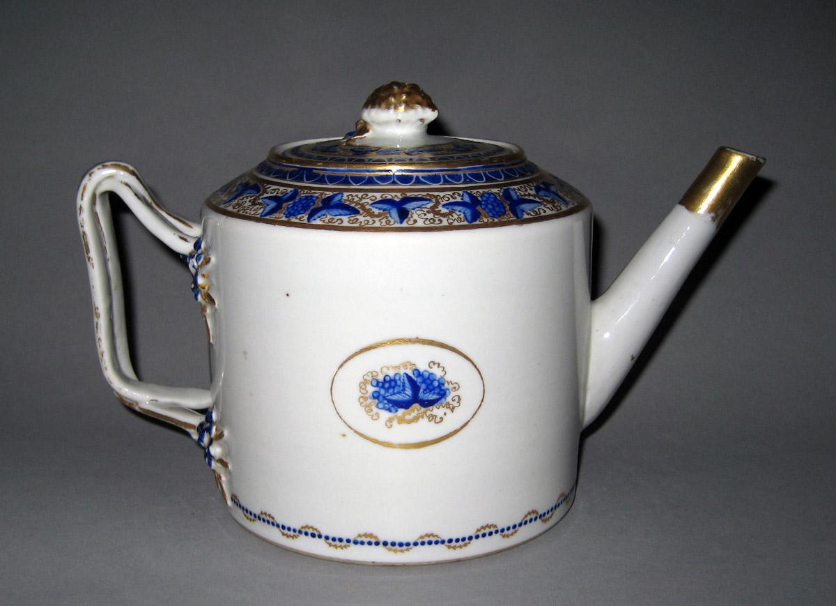 1958.2905 A, B Porcelain Teapot side 2