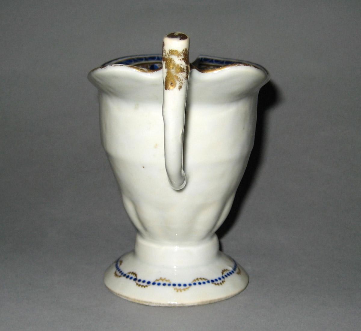 1958.2907 Porcelain Cream or milk jug back