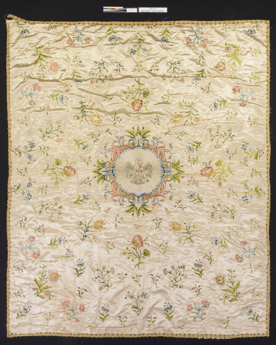 2011.0003 Bedcover, view 2, before conservation treatment