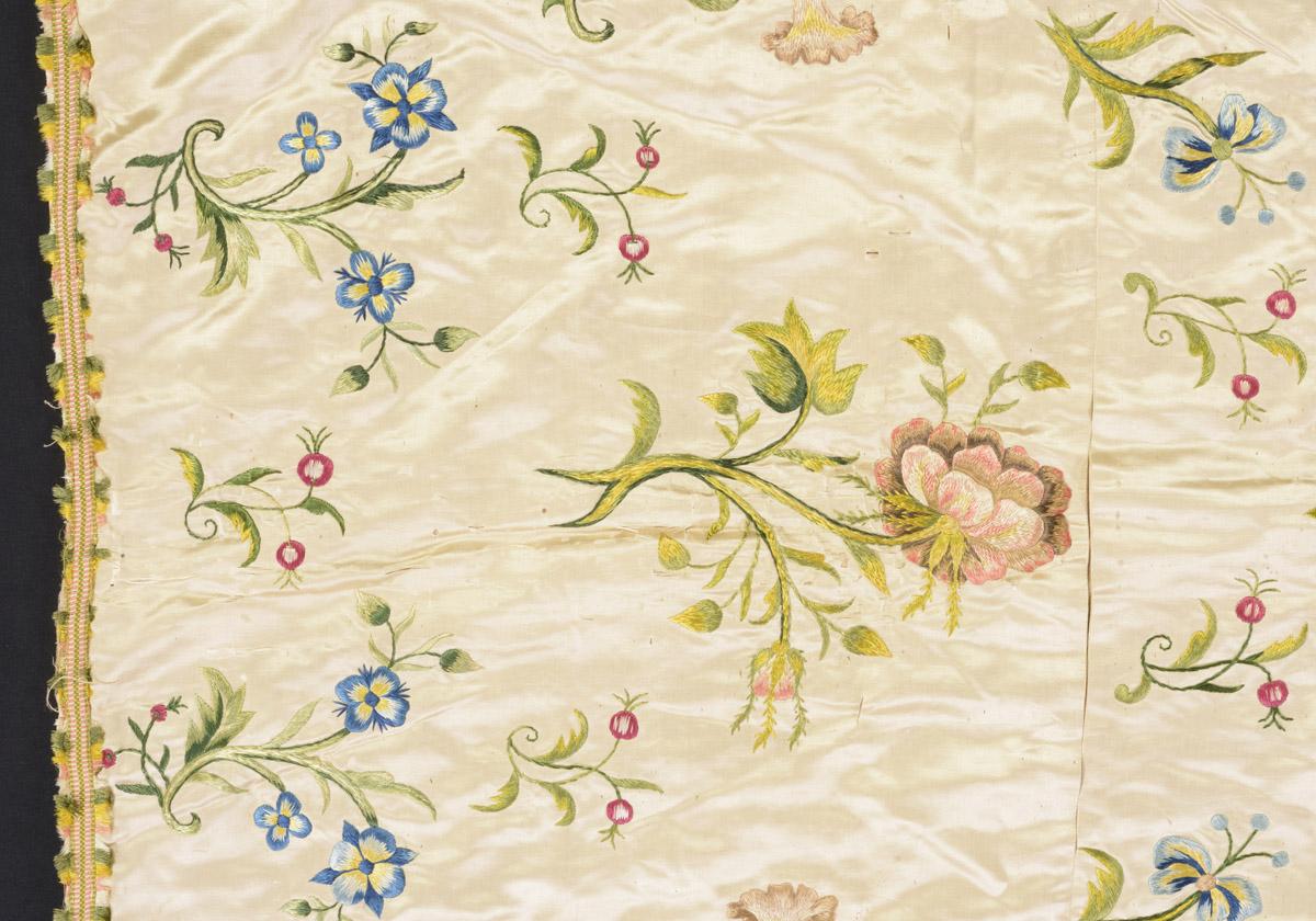 2011.0003 Bedcover, detail 3, before conservation treatment