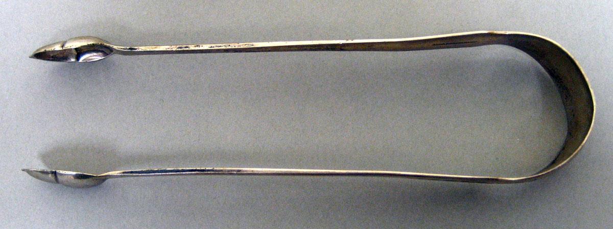 1965.3068 Silver Tongs view 1