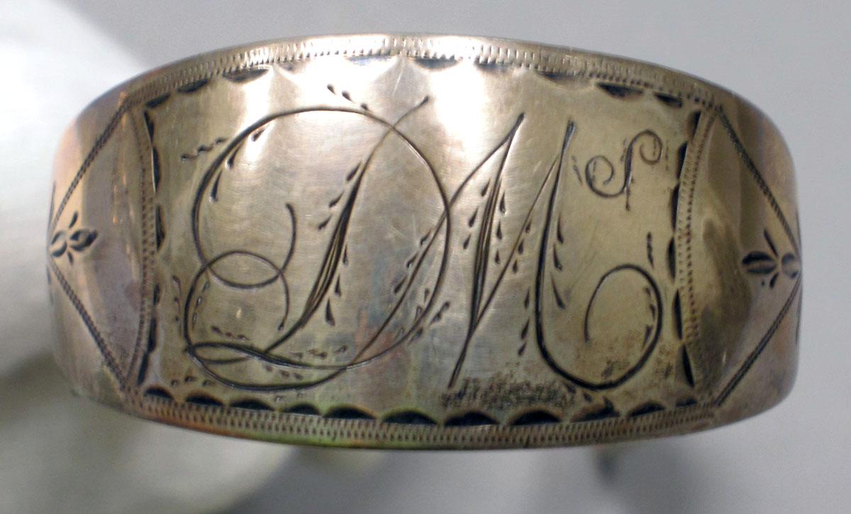 1965.3068 Silver Tongs engraving