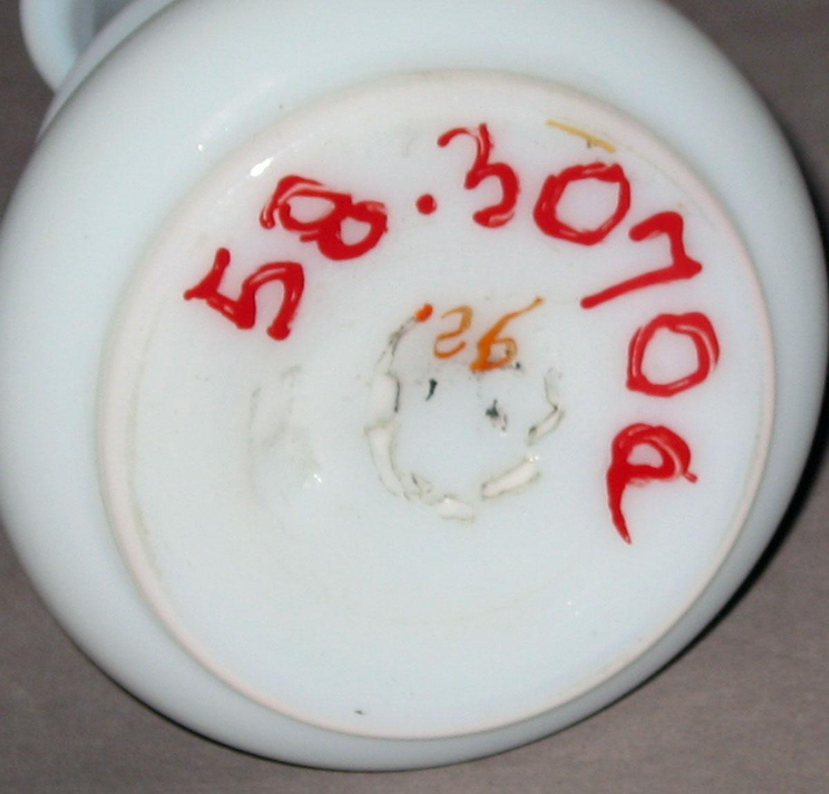 1958.3070 A White glass scent bottle (underside)