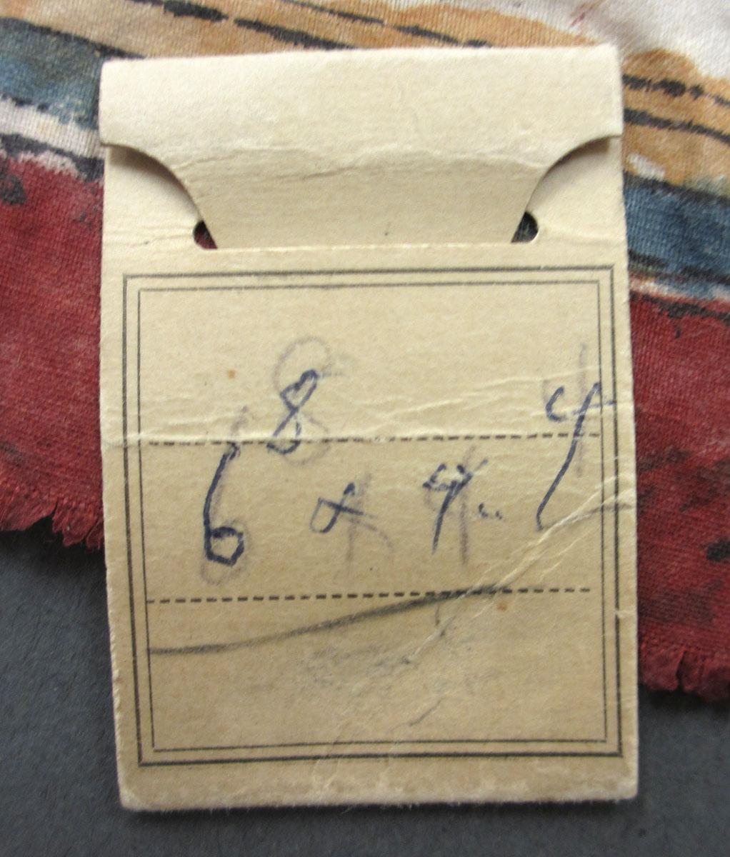 2011.0009.002 Textile, printed label upper surface