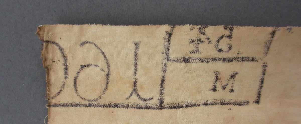 2011.0009.003 A Textile, printed inscription 2