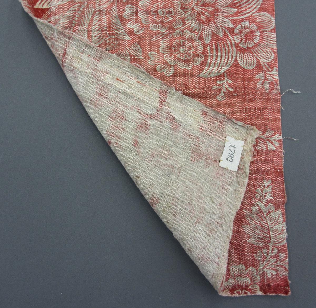 1969.8199.003 Textile, printed folded corner