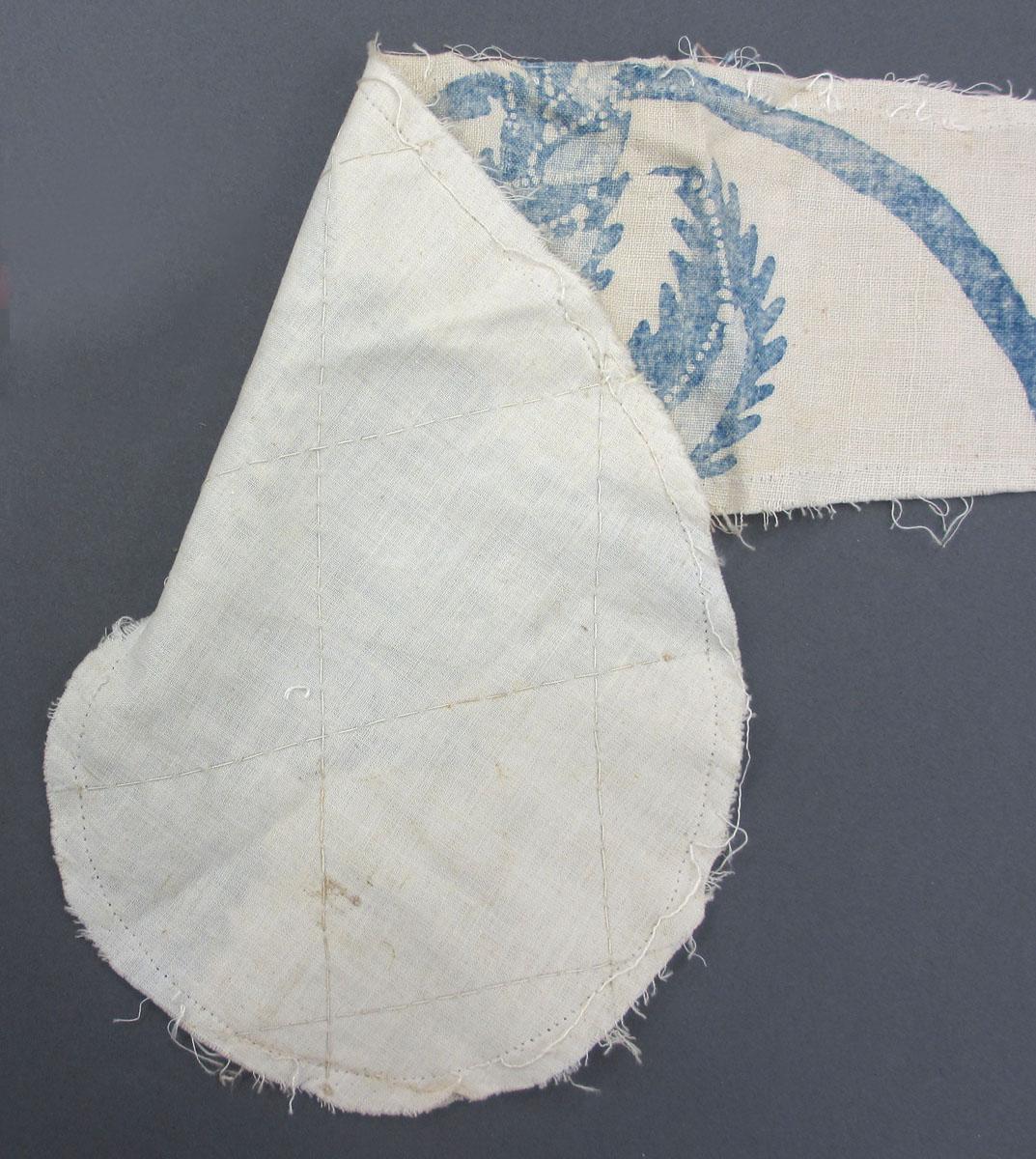 1969.8241.003 Textile, printed folded corner