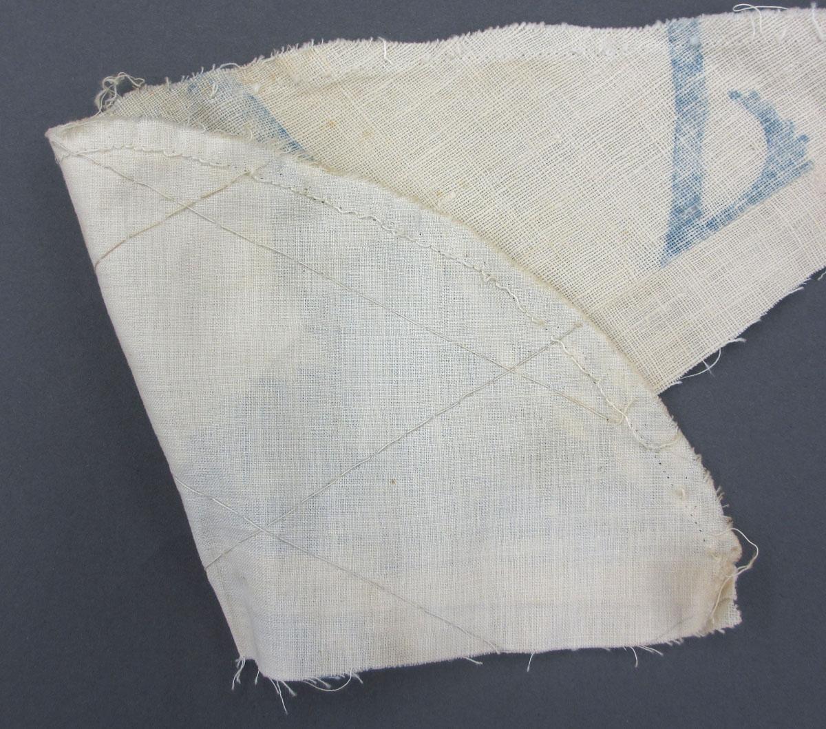 1969.8241.005 Textile, printed folded corner