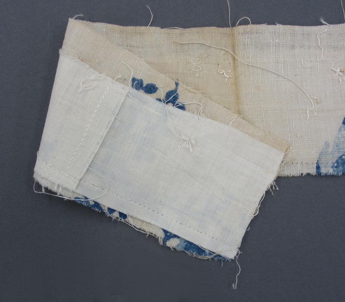 1969.8241.006 Textile, printed folded corner