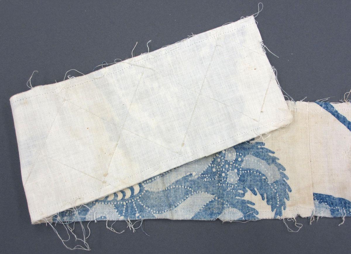 1969.8241.008 Textile, printed folded corner