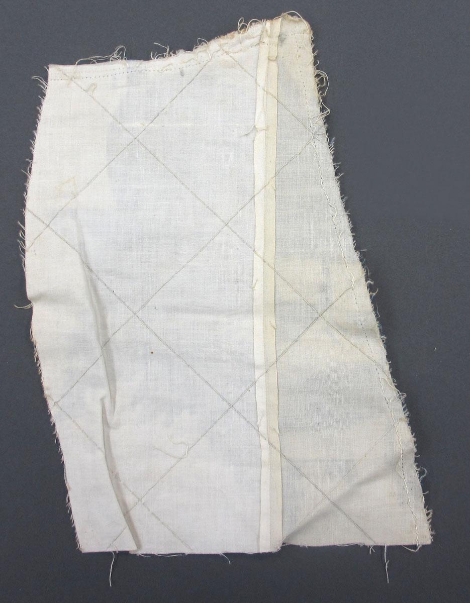 1969.8241.011 Textile fragment, printed reverse