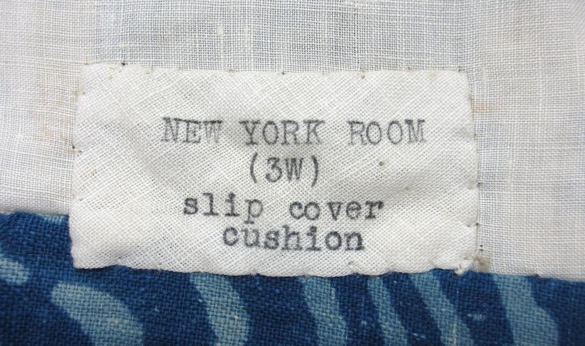 1969.8421.001 Slip cover, label