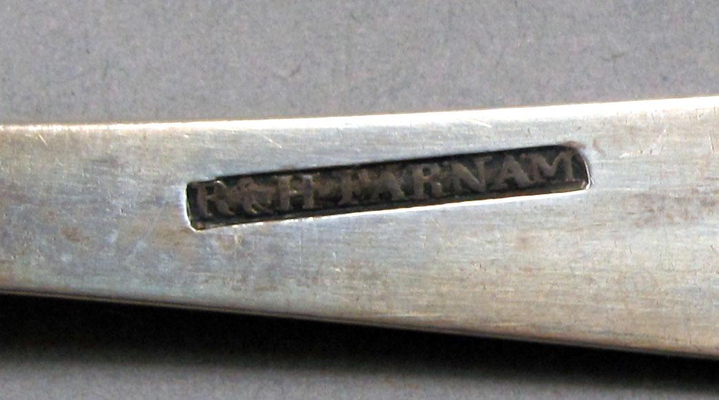 1959.0033.002 Silver spoon mark