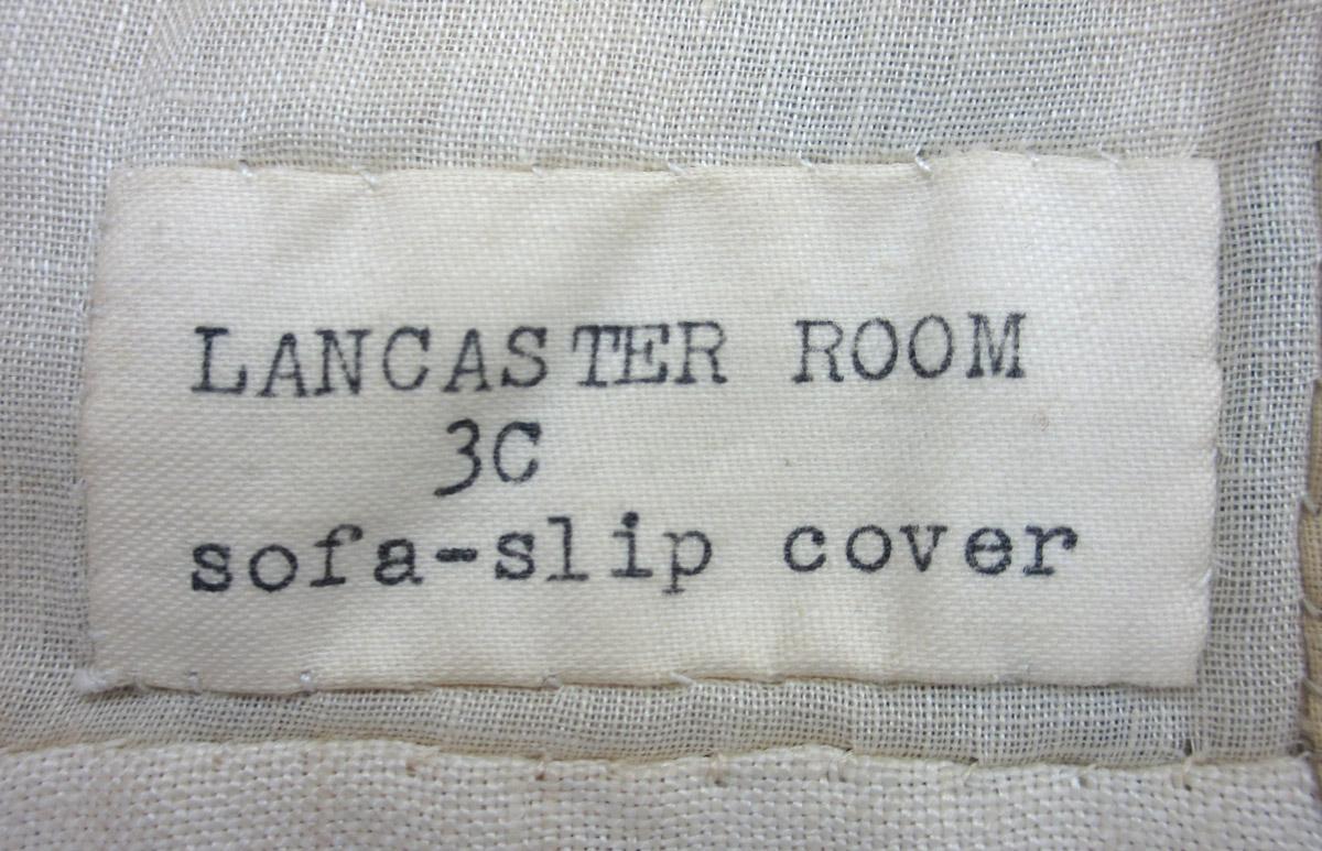 1969.8458 Slip cover label