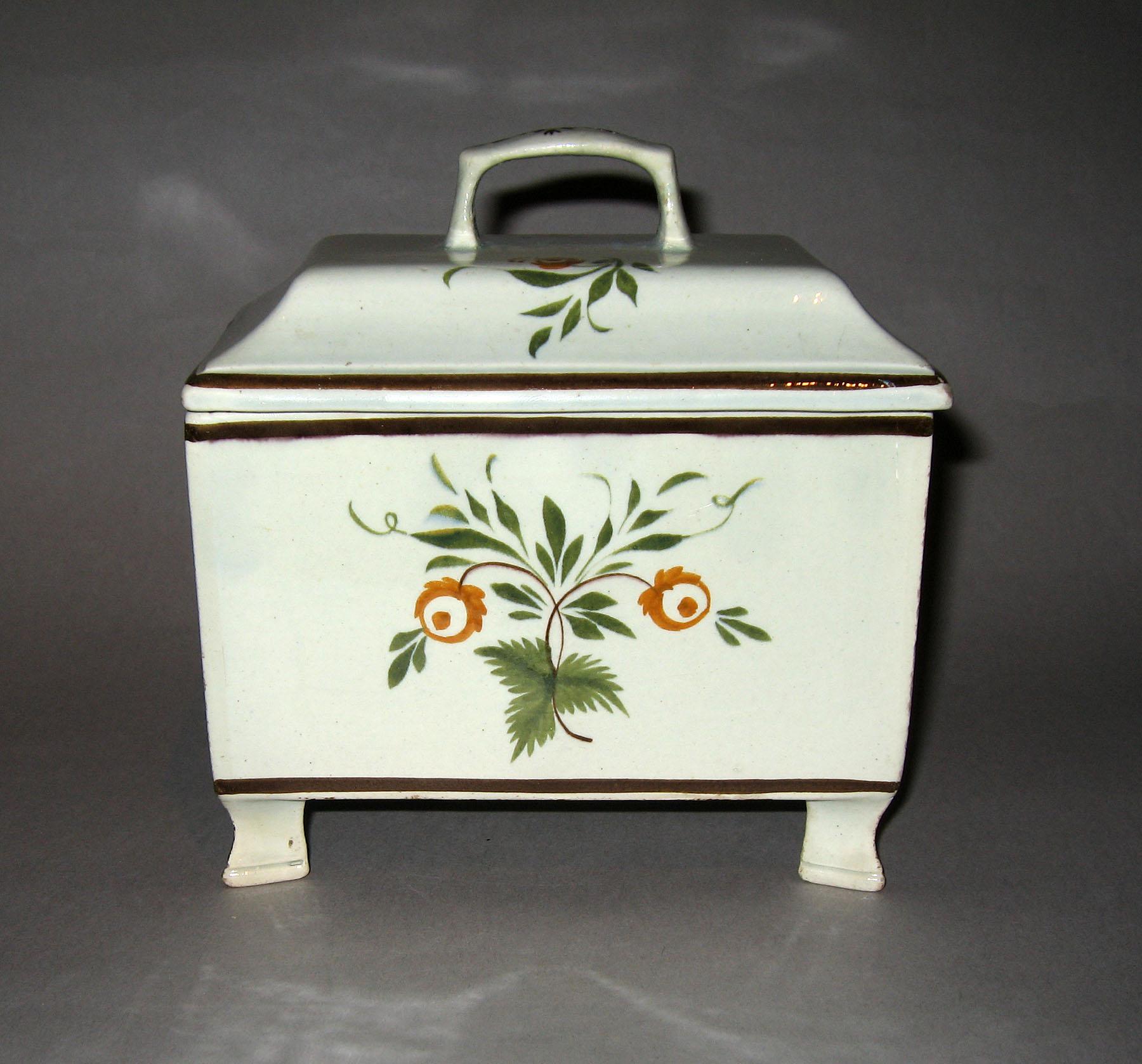 1959.0056 A, B Pearlware tea canister (opposite side)