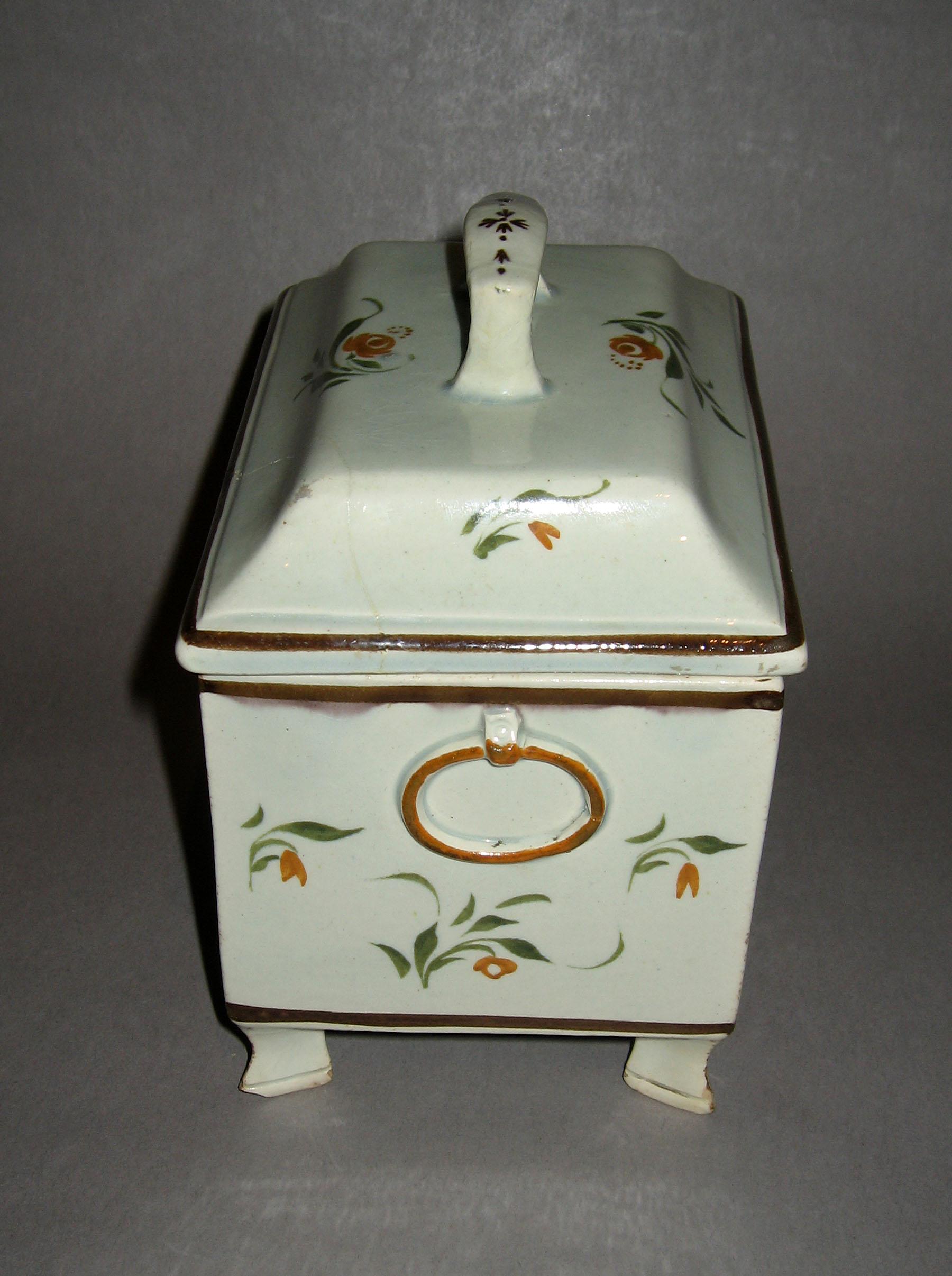 1959.0056 A, B Pearlware tea canister (narrow end)