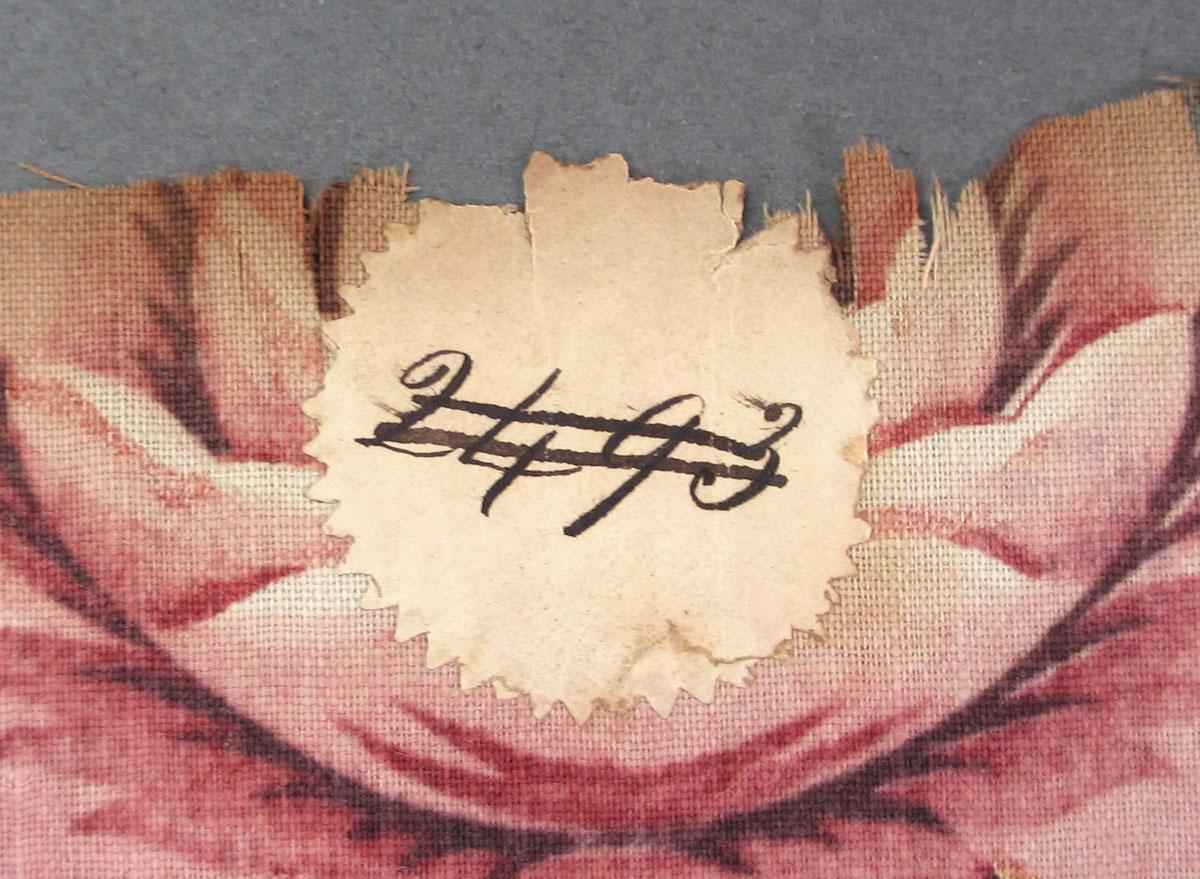 1959.0084.037 Textile, printed label