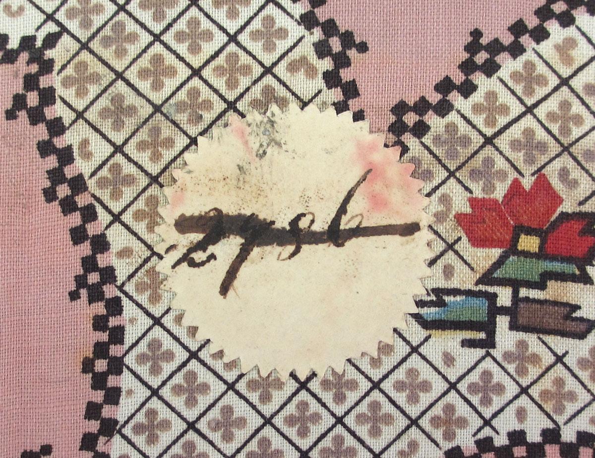 1959.0084.038 Textile, printed label