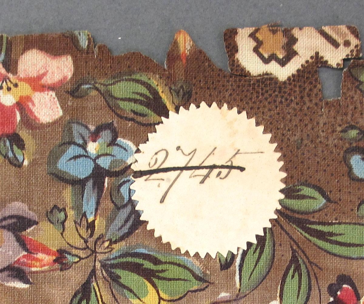 1959.0084.043 Textile, printed label