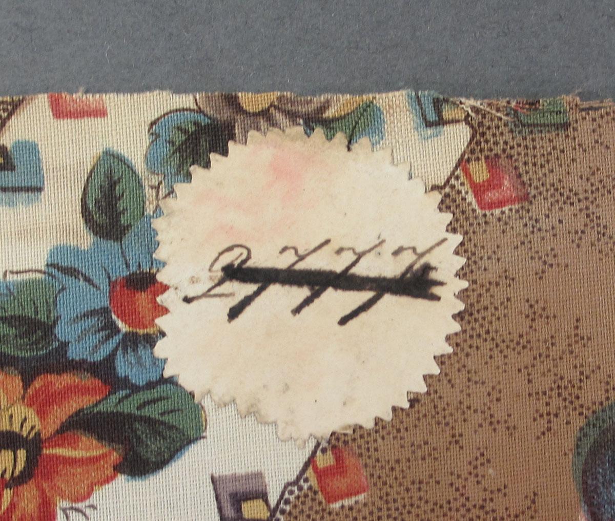 1959.0084.046 Textile, printed label