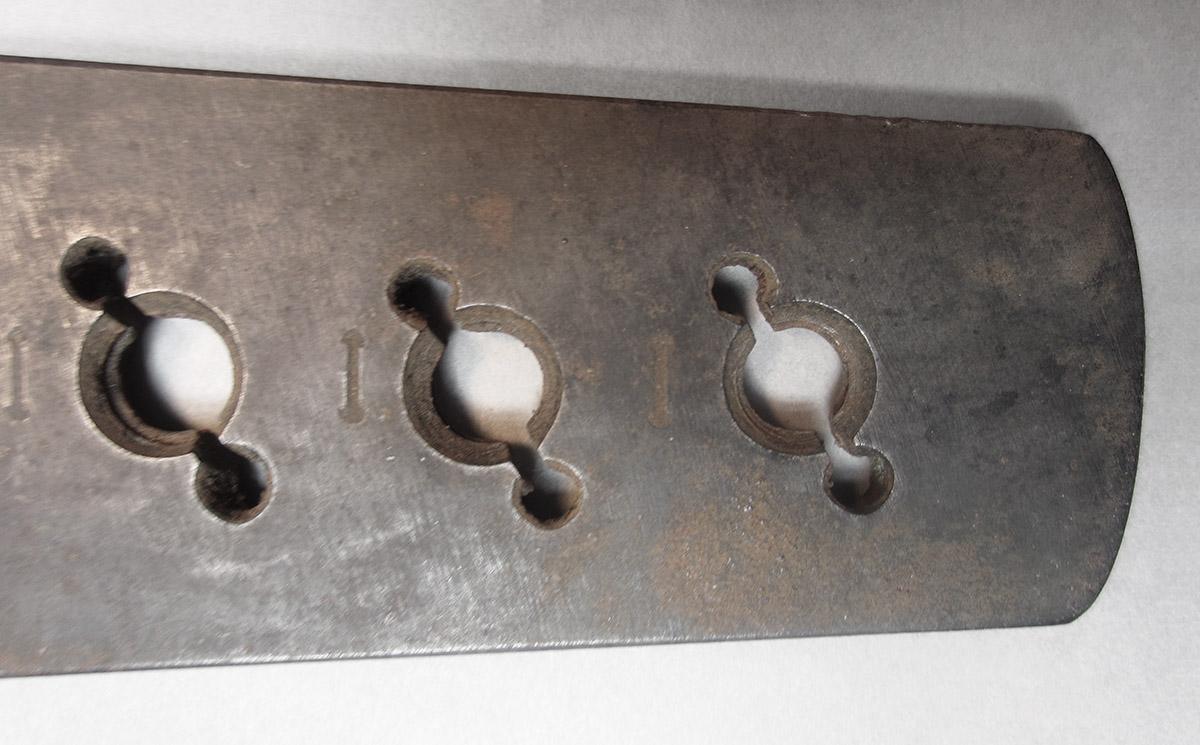 1957.0071.014, Screw plate, body detail