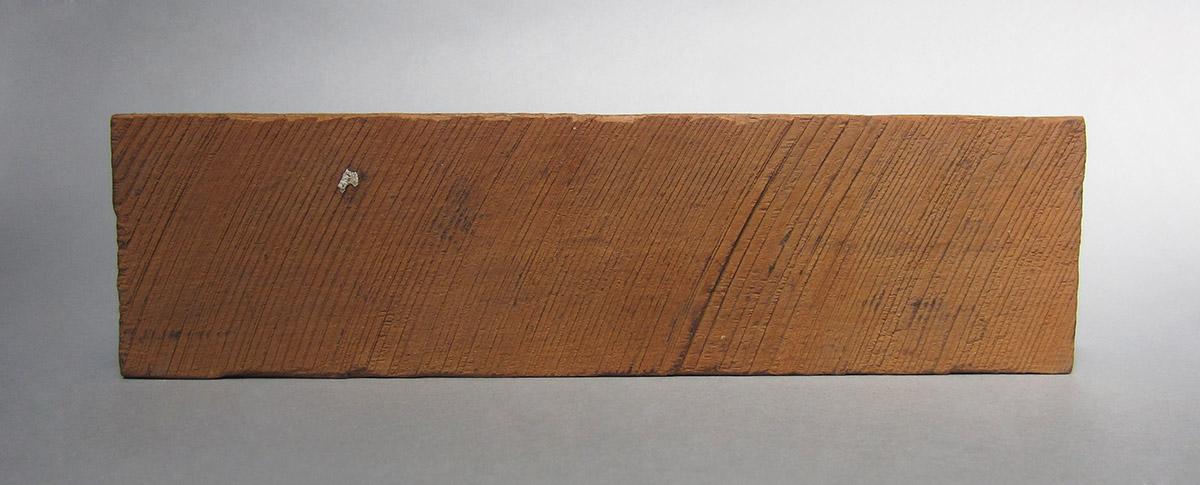 1957.0081.028, Block, side 1