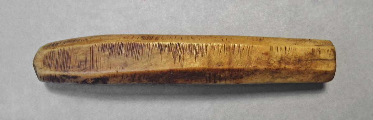 1957.0084.069, Handle, side 1