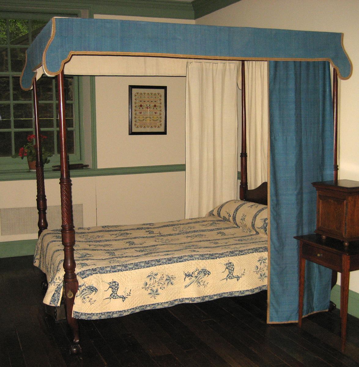 1957.0040.002 bedstead with bed hangings 1964.0512 and quilt 1955.0656 J, K view 2